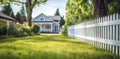 Idyllic Suburban Home with White Picket Fence Royalty Free Stock Photo