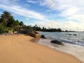 Sri Lanka paradise beach with white sand, Palm trees and a scenic sunset Royalty Free Stock Photo