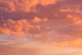 Idyllic sunshine sky with golden and pink clouds in blue sky as abstract texture, background. Royalty Free Stock Photo