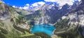 Idyllic swiss mountain lake Oeschinensee (Oeschinen) with turquise water and snowy peaks of Alps mountains.Switzerland Royalty Free Stock Photo