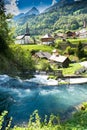 The idyllic Swiss village of Jaun and the Jaunfall waterfall in the Alps of canton Fribourg