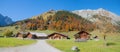 Idyllic tourist destination Eng Alm huts, karwendel mountains and landscape in autumn