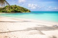 Idyllic tropical beach in Caribbean with white sand, turquoise ocean water and blue sky Royalty Free Stock Photo