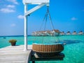 Idyllic tropical resort with stilt huts and jetty