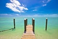 Idyllic turquoise bay and wooden dock in Islamorada on Florida Keys Royalty Free Stock Photo