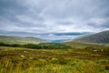 Idyllic view in Glendalough Valley, County Wicklow, Ireland. Mountains, lake and tourists walking paths Royalty Free Stock Photo