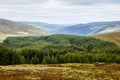 Idyllic view in Glendalough Valley, County Wicklow, Ireland. Mountains, lake and tourists walking paths Royalty Free Stock Photo