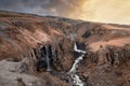 Idyllic view of Litlanesfoss waterfall in Eastfjords against sky during sunset Royalty Free Stock Photo