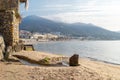 Idyllic view of long sandy beach with mountains in the background, seen from the old harbour on a sunny day in Cefalu, Sicily, Royalty Free Stock Photo