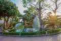 Idyllic View of the rocks Taihu stone in Nan Lian Park Hong Kong with idyllic topiary podocarpus and pine trees and