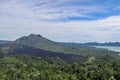 An idyllic view to the top of Mount Batur and the Danau Batur lake. There is a pathway along Batur volcano`s rim. Volcanic Royalty Free Stock Photo