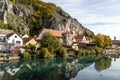 Idyllic view at the village Markt Essing in Bavaria, Germany with the Altmuehl river and high rocks i