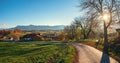 Idyllic village aidling, country road and walkway in rural bavarian landscape