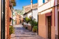 Idyllic village street with mediterranean buildings on Majorca, Spain Royalty Free Stock Photo