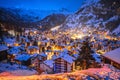 Idyllic village of Zermatt rooftops evening view, luxury winter destination