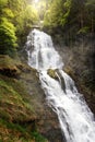 Idyllic waterfall in forest crashing over rocks. Famous Waterfalls Giessbach in the Bernese Oberland near Brienz