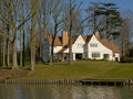 Idyllic wite villa along river Lys in Flanders, Belgium
