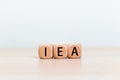 IEA on Wooden cube. International Energy Agency