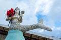 Iemanja statue in the Rio Vermelho beach fishermen colony holding red roses