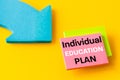 IEP Individual Education Plan symbol. Written on colorful cards, beautiful yellow background, positive bright colors, Pointing