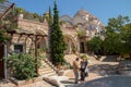 Iew on backyard of Monastery of Archangel Michael in Greece, Thasos Island, with vivid orange walls and roof,
