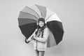 If it should rain. Happy small child in coat hold colorful umbrella against rain. Cute little girl with fashion Royalty Free Stock Photo