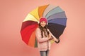 If it should rain. Happy small child in coat hold colorful umbrella against rain. Cute little girl with fashion Royalty Free Stock Photo