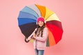 If it should rain. Happy small child in coat hold colorful umbrella against rain. Cute little girl with fashion Royalty Free Stock Photo