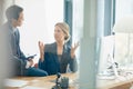 If you can imagine it you can create it. two businesspeople having a discussion in an office.