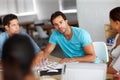 If you look over here...A group of businesspeople discussing work. Royalty Free Stock Photo