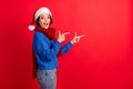 If you want christmas discount go here. Shocked girl santa claus headwear point finger copyspace indicate adverts wear