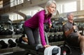 If you want to be fit, dont quit. a senior married couple working out together at the gym. Royalty Free Stock Photo