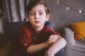 Ifestyle portrait of handsome thoughtful child boy Royalty Free Stock Photo