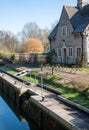 House overlooking Iffley Lock in the picturesque village of Iffley on the River Thames in Oxfordshire, UK Royalty Free Stock Photo