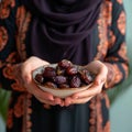 Iftar delight Modern Muslim woman holds plate of sweet dates