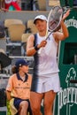 Iga Swiatek of Poland celebrates victory after women first round match against Cristina Bucsa of Spain at 2023 Roland Garros