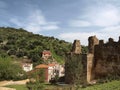 Iglesias with wall remains of the Castle Castello Salvaterra, Sardinia Royalty Free Stock Photo