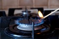 Ignition of a gas ring on the stove Royalty Free Stock Photo
