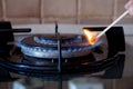 Ignition of a gas ring on the stove Royalty Free Stock Photo