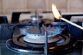 Ignition of a gas ring on the stove Royalty Free Stock Photo