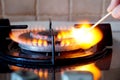 Ignition of a gas ring on the stove Royalty Free Stock Photo