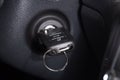 Ignition key in car. Black car key close-up. Royalty Free Stock Photo