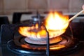 Ignition of a gas ring on the stove Royalty Free Stock Photo
