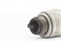 Ignition spark plug with platinum electrode. Automotive parts isolated above white background