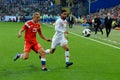 Igor Smolnikov against Turkish midfielder Okay Yokuslu