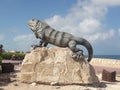 Iguana statue on Isla Mujeres island off Cancun Mexico lizard reptile wildlife travel tourism water ocean sky blue