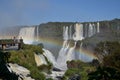 Iguazu waterfalls rainbow on sunny