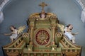 IHS sign on the altar in the Basilica of the Sacred Heart of Jesus in Zagreb