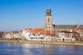 IJssel river and church tower in the skyline of Deventer Royalty Free Stock Photo