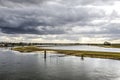 Ijssel river under a cloudy sky